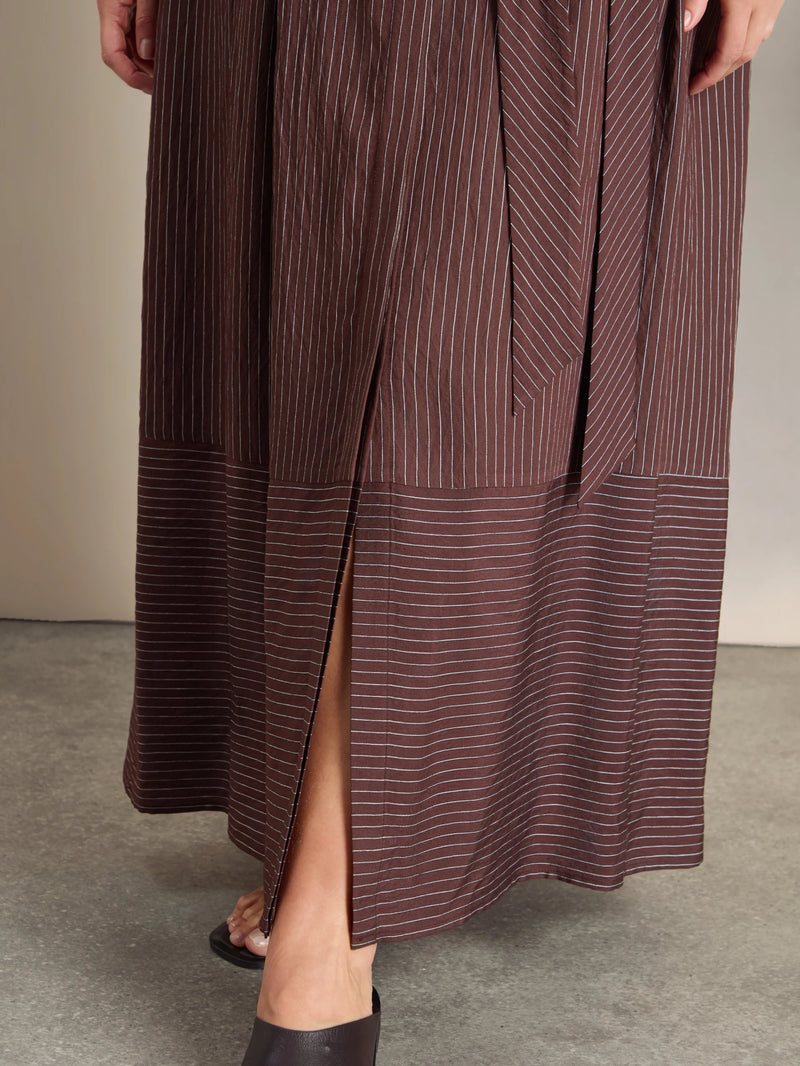 Plus size brown striped maxi shirt dress with waist tie, collared neckline and button-through front
