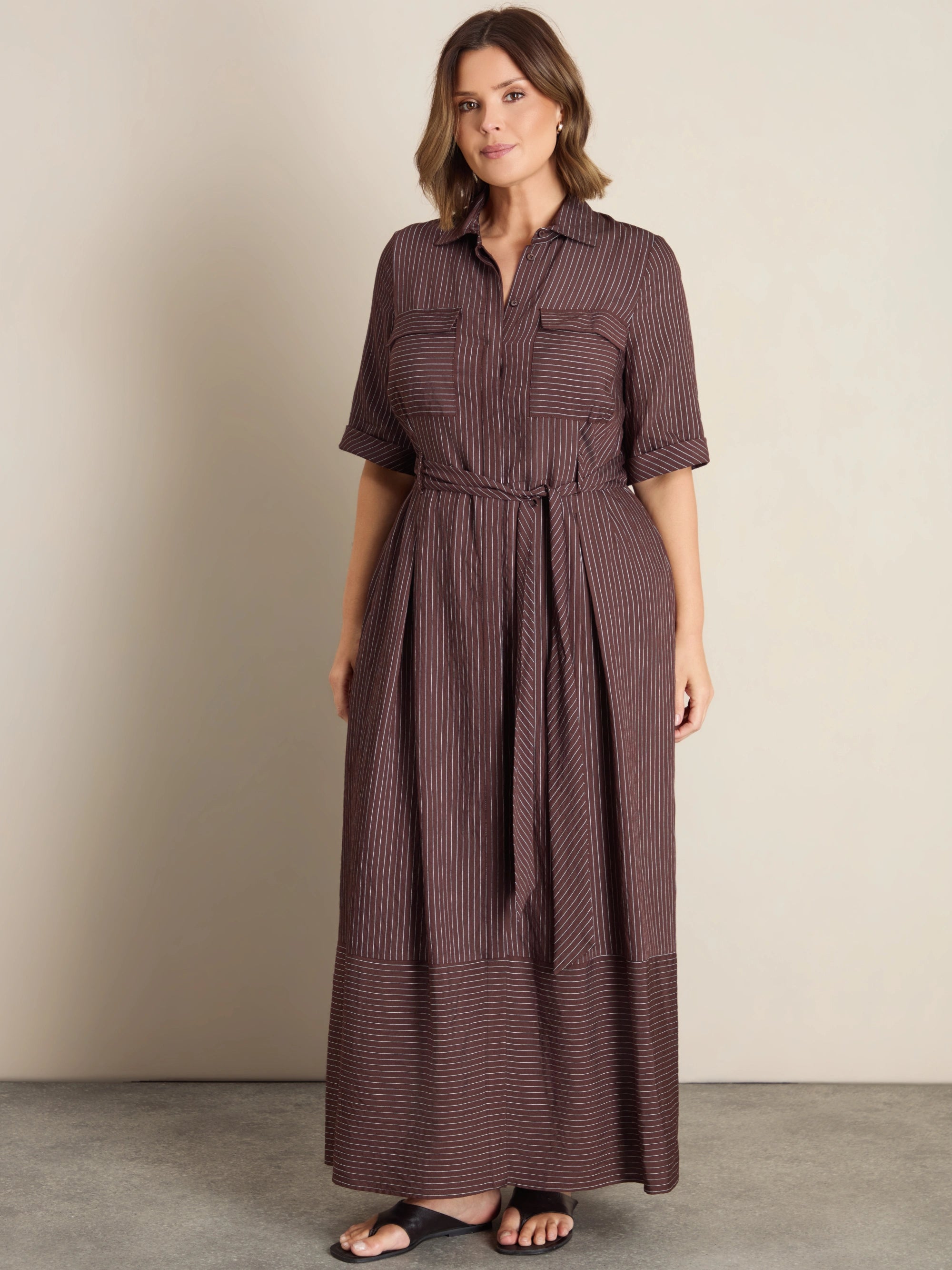 Petite plus size brown striped maxi shirt dress with waist tie, collared neckline and button-through front