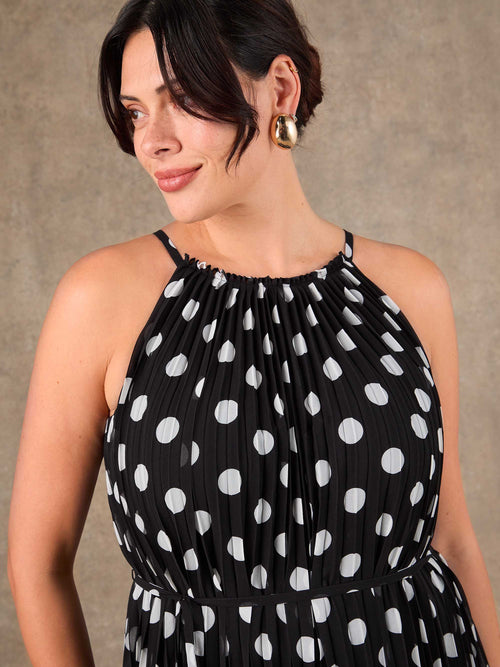 Curve black and white polka dot halterneck pleated maxi dress perfect for formal occasions.
