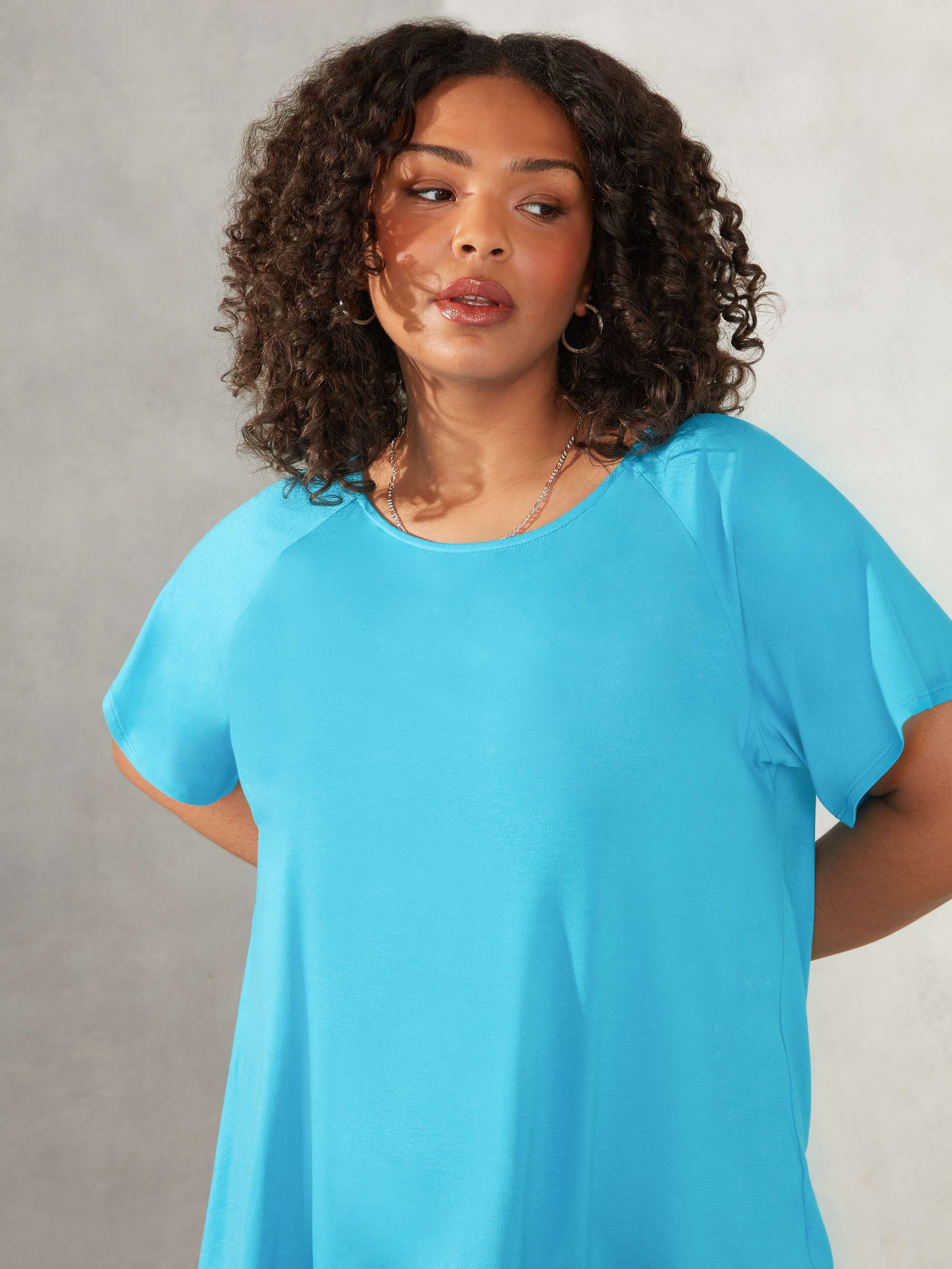 Turquoise Flutter Sleeve Jersey Top